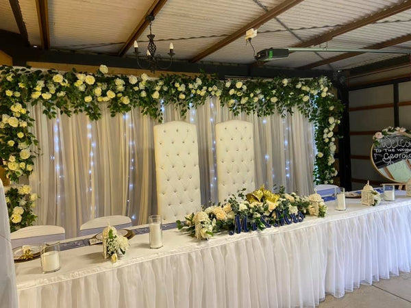 Floral with white curtain backdrop