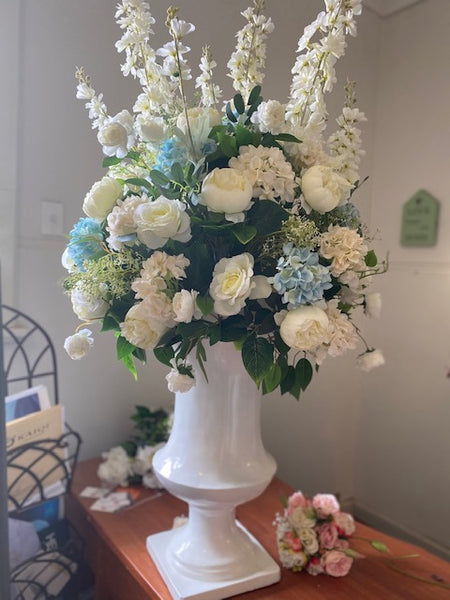 Large white vase with flower