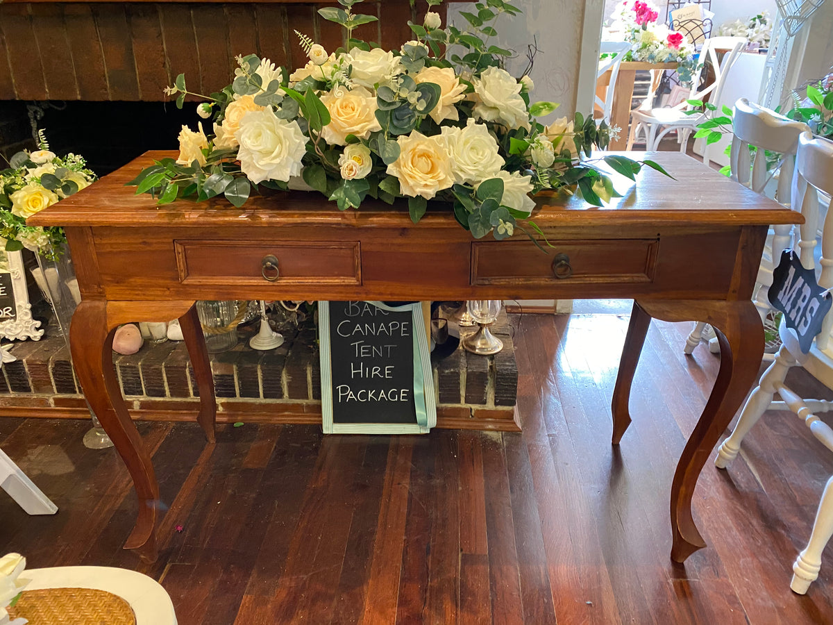 Brown wooden signing table – Rosy Events Hire