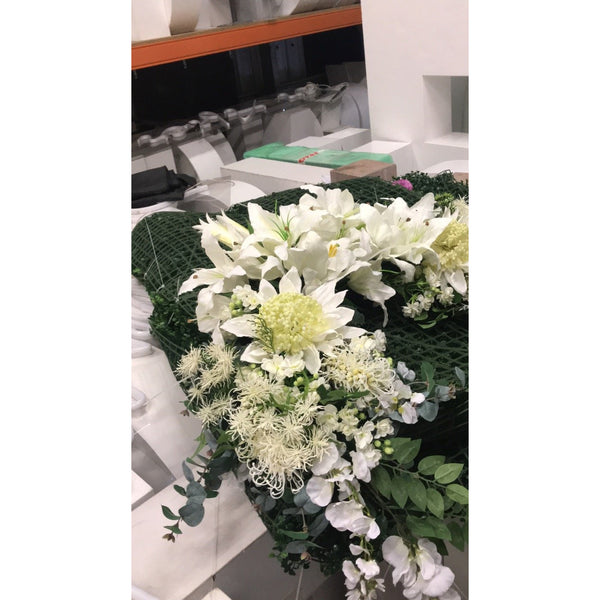 White L shape native florals arrangement