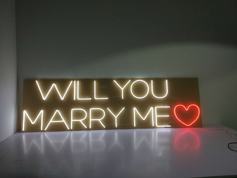 "will you merry me " neon sign